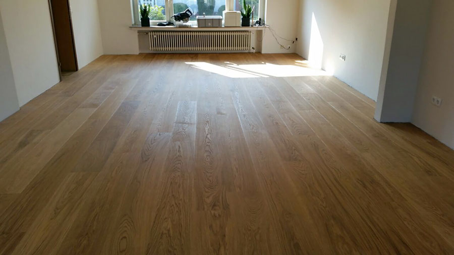 Parkettsanierung: Ausbau von Mosaikparkett und Neuverlegung von Landhausdielen im XL-Format-13