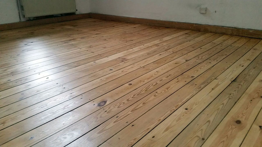 Professionelle Renovierung und Versiegelung von 50 Jahre alten Holzdielen in Bochum-Bild-04